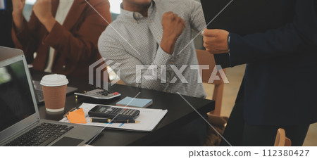 Business team meeting working with new startup project, discussion and analysis data the charts and graphs. Digital tablet, calculator, laptop computer using, Business finance and accounting concept. Business team meeting working with new startup project, discussion and analysis data the charts and graphs. Digital tablet, calculator, laptop computer using, Business finance and accounting concept. 112380427