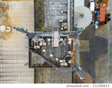 Industrial Ballet: Aerial View of Machinery and Material Layout 112380613