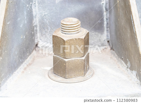 Old Metal male square nut screw nail heads stackable to attach to large light pole bases. To attach structure of wall to be strong for house or various industrial. Bolts and screws. Old Metal male square nut screw nail heads stackable to attach to large light pole bases. To attach structure of wall to be strong for house or various industrial. Bolts and screws. 112380983