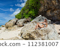Beautiful young woman in a swimsuit in Bali 112381007