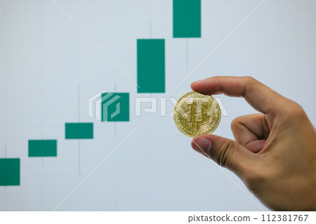 Bitcoin's uptrend and bullish Trend with a Trading Graph in the background. 112381767