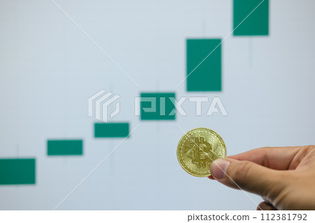 Bitcoin's uptrend and bullish Trend with a Trading Graph in the background. Bitcoin's uptrend and bullish Trend with a Trading Graph in the background. 112381792