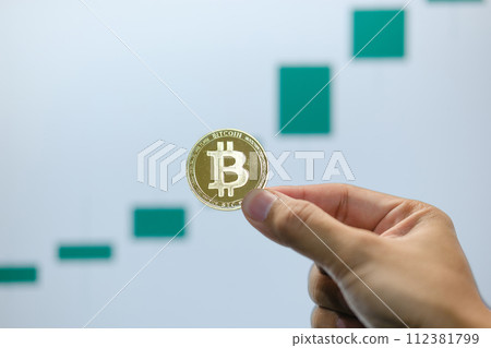 Bitcoin's uptrend and bullish Trend with a Trading Graph in the background. Bitcoin's uptrend and bullish Trend with a Trading Graph in the background. 112381799