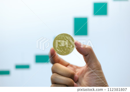 Tether USDT cryptocurrency with a growing trend on the chart on a background. 112381807