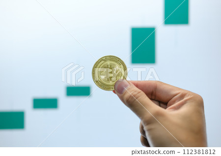 Bitcoin's uptrend and bullish Trend with a Trading Graph in the background. Bitcoin's uptrend and bullish Trend with a Trading Graph in the background. 112381812