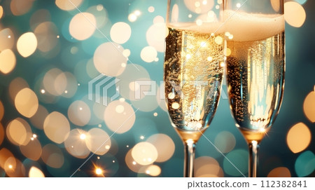 AI-generated content. A champagne toast celebration with golden glitter over a blue abstract background and defocused bokeh lights for a happy new year 112382841
