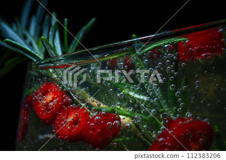 alcoholic cocktail with rosemary and pepperoni alcoholic cocktail with rosemary and pepperoni 112383206