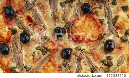 Italian pizza napoli with sardines 112383210