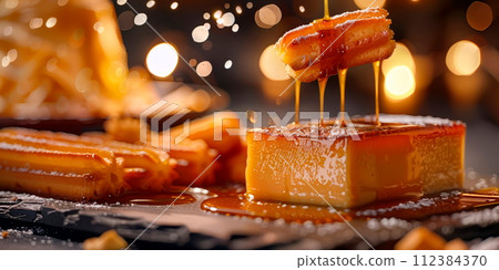 Mexican desserts, including churros, flan, and tres leches cake. 112384370