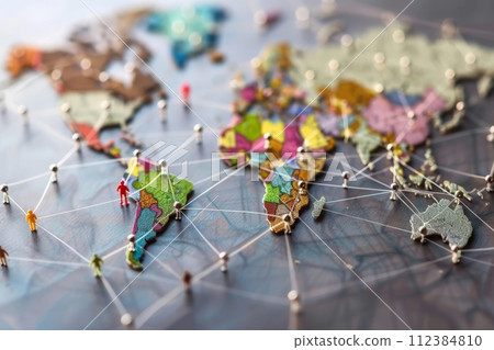 Map of the world on a wooden background. The concept of travel and communication. Map of the world on a wooden background. The concept of travel and communication. 112384810