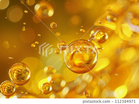 Golden yellow bubble oil or serum,close up 112384971