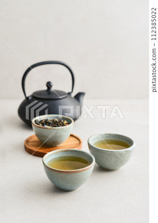 two ceramic cups of green tea 112385022