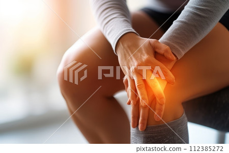 Woman suffering from knee pain, closeup. Health care and medical concept Woman suffering from knee pain, closeup. Health care and medical concept 112385272