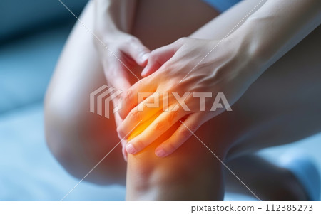 Woman suffering from knee pain, closeup. Health care and medical concept Woman suffering from knee pain, closeup. Health care and medical concept 112385273