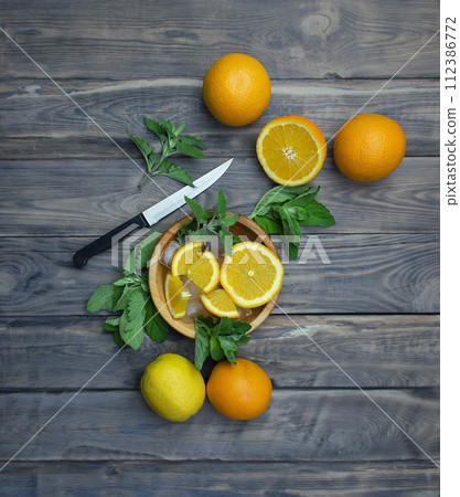 Citrus and mint. Vitamins. Fruit on the table. Immunity boosting drink and ingredients on table. 112386772