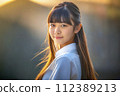 portrait of a beautiful Asian young girl with long straight hair 112389213