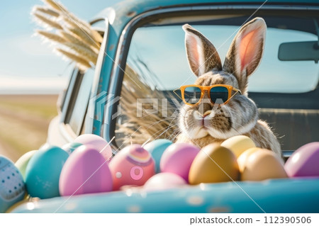 AI-generated content. A rabbit wearing sunglasses sits in a car with a bunch of Easter eggs 112390506