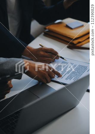 Consultation and conference of Male lawyers and professional businesswoman working and discussion having at law firm in office. Concepts of law, Judge gavel with scales of justice. 112390829