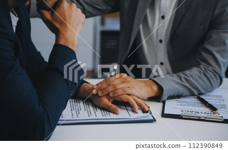 Consultation and conference of Male lawyers and professional businesswoman working and discussion having at law firm in office. Concepts of law, Judge gavel with scales of justice. 112390849