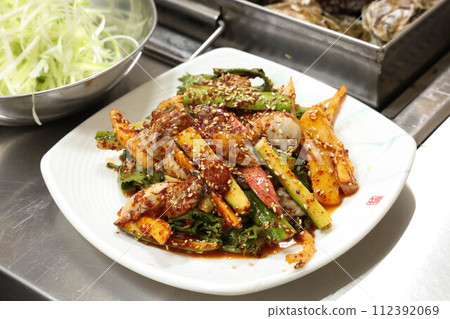 Korea style food. Raw Oyster spicy sauce Salad Korea style food. Raw Oyster spicy sauce Salad 112392069