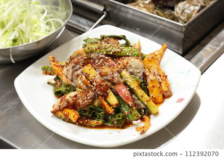 Korea style food. Raw Oyster spicy sauce Salad 112392070