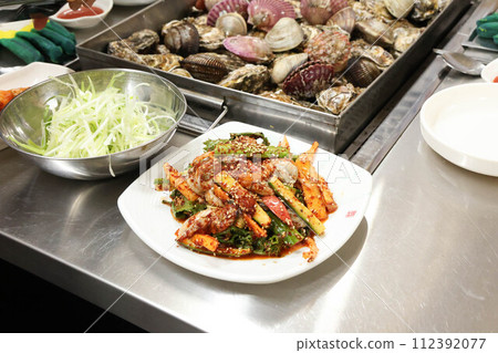 Korea style food. Raw Oyster spicy sauce Salad Korea style food. Raw Oyster spicy sauce Salad 112392077