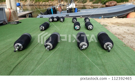 The tanks are ready for a diving trip. The tanks are ready for a diving trip. 112392465