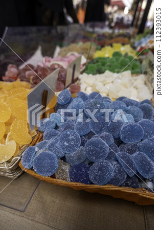 Detail of sweet fruit gummies in a market, unhealthy food 112393015
