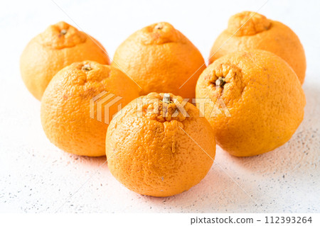 Dekopon with scratches and irregularities Dekopon with scratches and irregularities 112393264