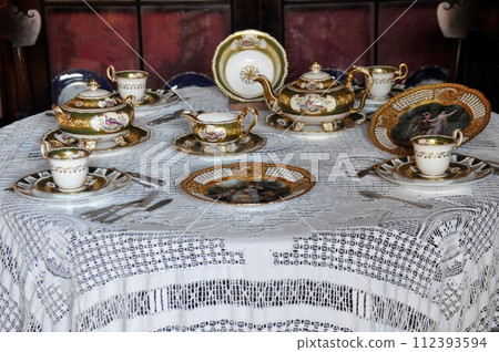 Cuba, Trinidad, Romantico Museum, salon, tablecloth, tea set 112393594