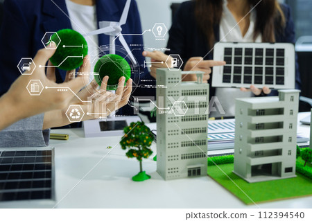 Business tam using tablet for working technology and business, Renewable energy-based green businesses and global warming. Reduce CO2 emission. Business tam using tablet for working technology and business, Renewable energy-based green businesses and global warming. Reduce CO2 emission. 112394540