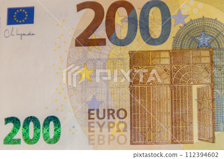 Macro shot of two hundred euro banknote Macro shot of two hundred euro banknote 112394602