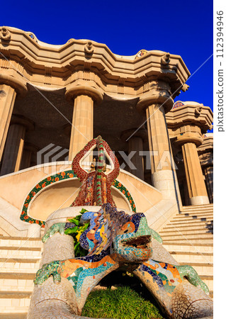 Multicolored mosaic dragon salamander of Gaudi in Park Guell, Barcelona, Spain Multicolored mosaic dragon salamander of Gaudi in Park Guell, Barcelona, Spain 112394946