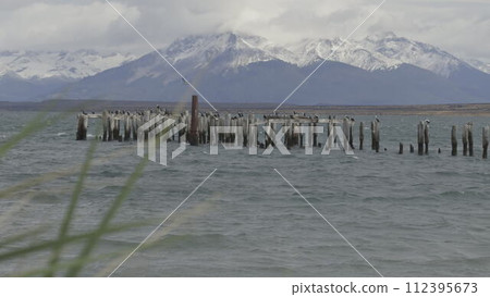Slow Motion Video of an Old Wooden Pier in Patagonian Puerto Natales 112395673