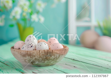 A row of colorful pastel Easter eggs with flowers, each uniquely painted with different texture on a blue background A row of colorful pastel Easter eggs with flowers, each uniquely painted with different texture on a blue background 112397867