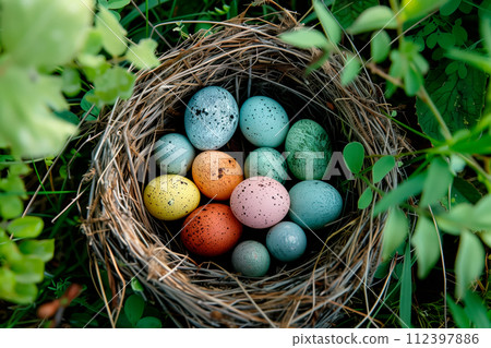 A birds nest with pastel Easter eggs, each uniquely painted with unique pattern on a solid background A birds nest with pastel Easter eggs, each uniquely painted with unique pattern on a solid background 112397886