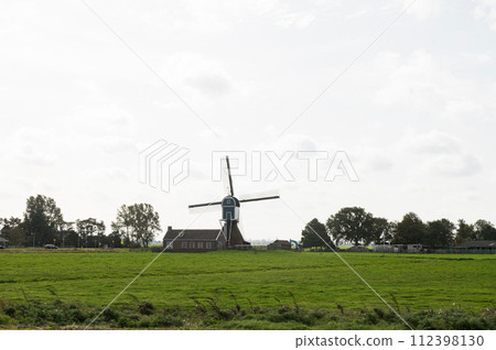 Windmill in Rural Landscape Windmill in Rural Landscape 112398130