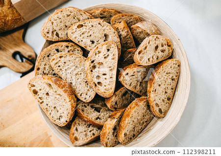 Sliced Artisan Whole Grain Bread in Bowl Sliced Artisan Whole Grain Bread in Bowl 112398211