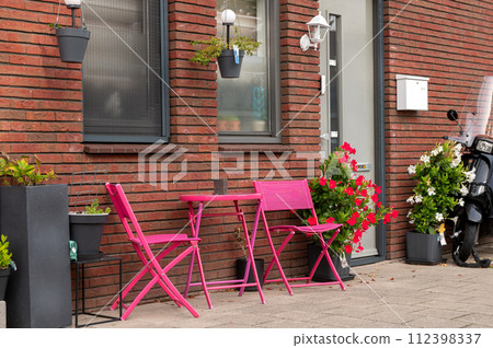 Pink Bistro Set on Urban Patio 112398337