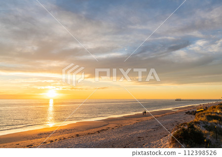 Henley Beach coastline with jetty at sunset 112398526