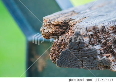 A wooden bench in a city park has become unusable due to the impact of natural factors such as humidity, fungal pathogens, ultraviolet rays and time on the wood material. Obsolescence A wooden bench in a city park has become unusable due to the impact of natural factors such as humidity, fungal pathogens, ultraviolet rays and time on the wood material. Obsolescence 112398743