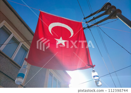 The tradition of hanging the Turkish national flag on the street during festive events, such as weddings, public holidays The tradition of hanging the Turkish national flag on the street during festive events, such as weddings, public holidays 112398744