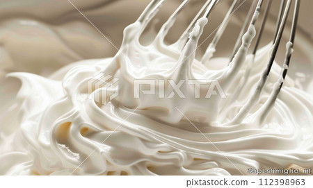 whipped and fluffy egg whites 112398963