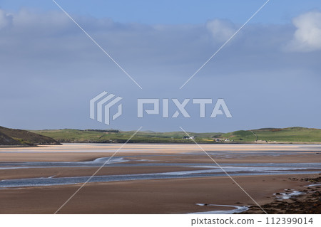 Clear sky above, Kyle of Durness reveals vast tidal flats, sand and water weaving patterns Clear sky above, Kyle of Durness reveals vast tidal flats, sand and water weaving patterns 112399014