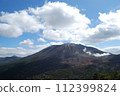 Mt. Karakuri, smoke and clouds with the Kirishima mountain range in the background 112399824