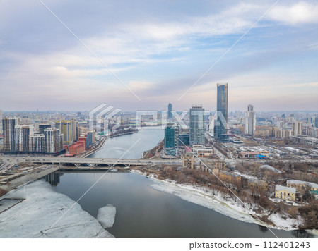Yekaterinburg aerial panoramic view in spring at sunset. Yekaterinburg city and pond in spring or autumn. Yekaterinburg aerial panoramic view in spring at sunset. Yekaterinburg city and pond in spring or autumn. 112401243