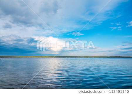 Blue lake with cloudy sky, natural background Blue lake with cloudy sky, natural background 112401340