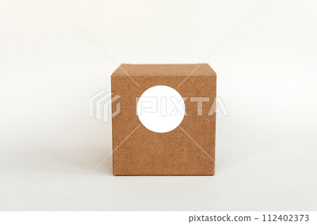 Round sticker mockup on gift box, tech box and blank sticker, adhesive label 112402373