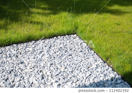 Gravel and Grass Garden Detail 112402392