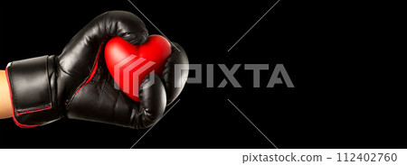 Black Boxing Glove Holding a Red Heart on a Black Background - Generative Ai Black Boxing Glove Holding a Red Heart on a Black Background - Generative Ai 112402760